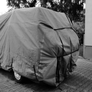 SUV protected with a grey waterproof top cover