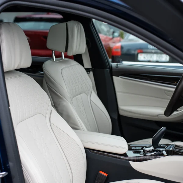 Car interior with white leather seat covers